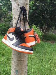 Jordan 1 High Sneakers in Black, White and Orange