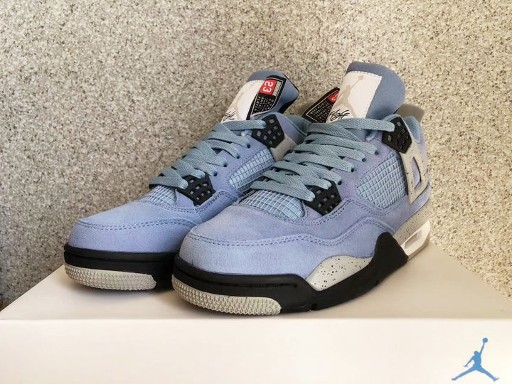 Jordan 4 Retro University Blue Sneakers