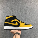 Air Jordan 1 Mid Black and Yellow Sneakers