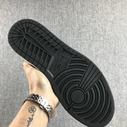 Air Jordan 1 Mid Black and Yellow Sneakers
