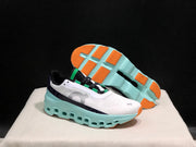 On Cloudmonster Running Shoes in White and Aqua