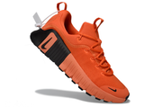 Nike Free Sneakers in Orange and Black