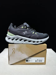 On Cloudsurfer Running Shoes in Black and Glacier
