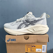 ASICS NOVABLAST 5 LE Running Shoes, White and Black