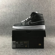 Air Jordan 1 Mid Black and White Sneakers 852542-016