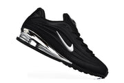 Nike Black and Silver Plated-Detail Sneakers