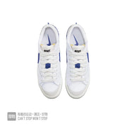 Nike Blazer Low 77 Sneakers in White and Blue