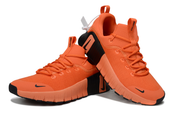 Nike Free Sneakers in Orange and Black