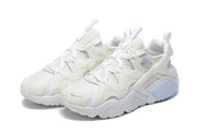 Nike Air Huarache Run Sneakers in White and Pale Blue