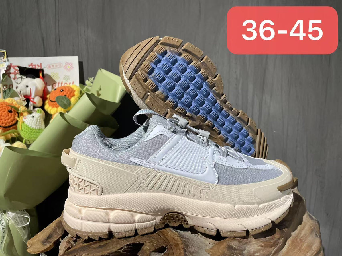 Nike F7 Gen 2 Sneakers in Gray and White
