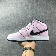Air Jordan 1 Mid Pink and Black High-Top Sneakers