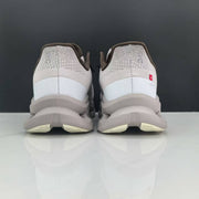 On Cloudmonster Running Shoes in Light Gray and Taupe