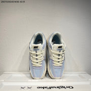 Nike Air Zoom Vomero 5 Sneakers in Cream, Blue and Lavender