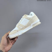 Louis Vuitton Trainer Low-Top Sneakers in Black and White