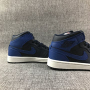 Air Jordan 1 Mid Black and Royal Blue High-Top Sneakers