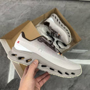 On Cloudmonster Running Shoes in Light Gray and Taupe