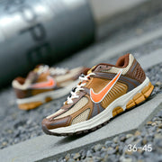 Nike Air Zoom Vomero 5 Sneakers in Brown and Orange