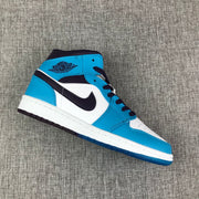 Air Jordan 1 Mid Sneakers in Blue, White and Black