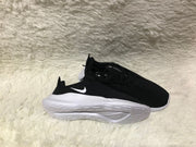 Nike Black and White Knit Low-Top Sneakers