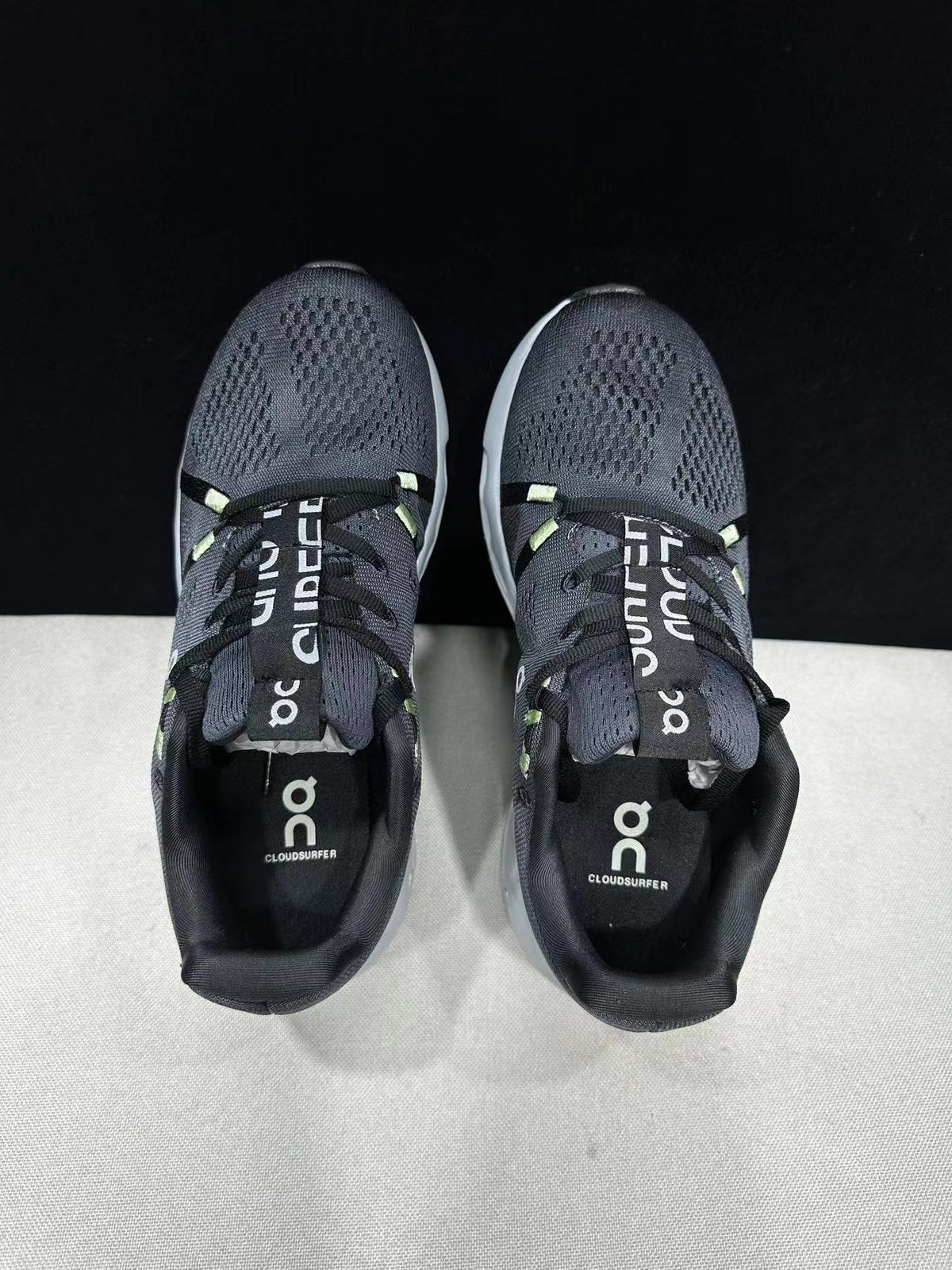 On Cloudsurfer Running Shoes in Black and Glacier
