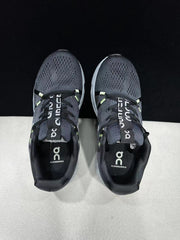 On Cloudsurfer Running Shoes in Black and Glacier