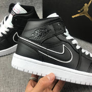Air Jordan 1 Mid Black and White Sneakers 852542-016