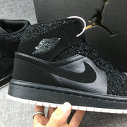 Jordan Air Jordan 1 Mid Black and White Sneakers 554724-001
