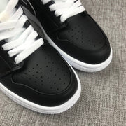 Air Jordan 1 Mid Black and White Sneakers 852542-016