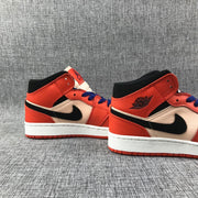 Jordan Air Jordan 1 Mid GS Sneakers in Pink and Orange