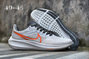 Nike Road Running Shoes in Light Gray with Orange Swoosh