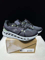 On Cloudsurfer Running Shoes in Black and Glacier