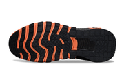 Nike Free Sneakers in Orange and Black