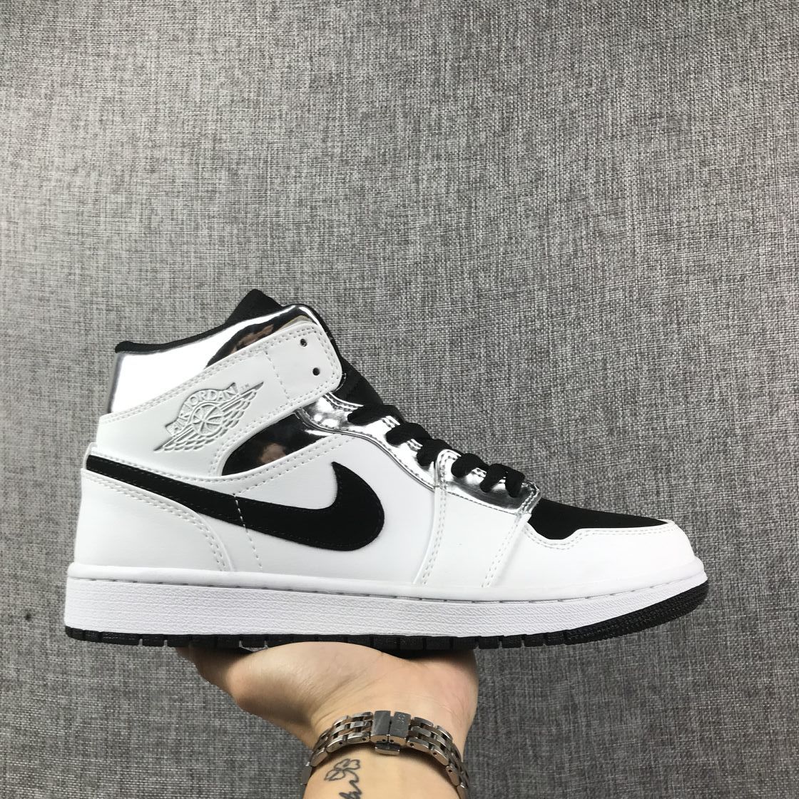 Air Jordan 1 Mid White and Black Sneakers