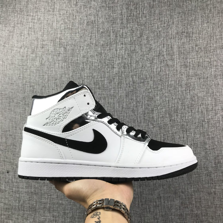 Air Jordan 1 Mid White and Black Sneakers