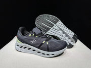 On Cloudsurfer Running Shoes in Black and Glacier