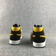 Air Jordan 1 Mid Black and Yellow Sneakers