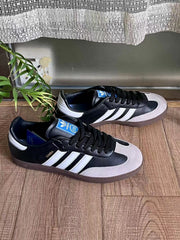Adidas Samba Sneakers in Black, White and Gum