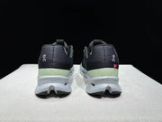 On Cloudsurfer Running Shoes in Black and Glacier