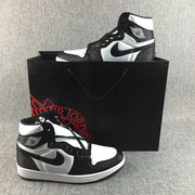 Air Jordan 1 High Black and White Satin-Style Sneakers
