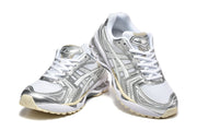 ASICS Gel-Kayano 14 Sneakers in White and Silver