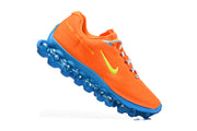 Nike Air Max Plus Orange and Blue Sneakers
