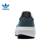 Adidas White and Green Platform Sneakers with Mauve Stripes