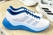 White and Blue Performance Running Shoes