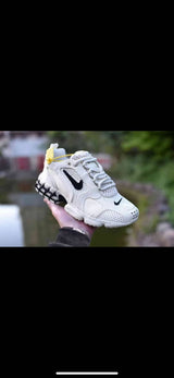 Nike White and Black Sneakers with Yellow Accents