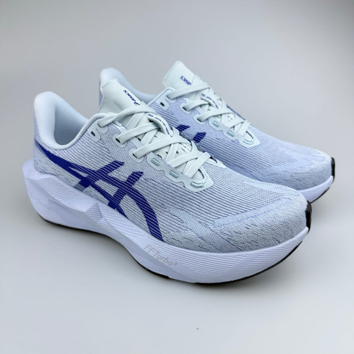 ASICS N10 Running Shoes in White and Blue
