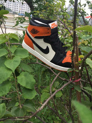 Jordan 1 High Sneakers in Black, White and Orange
