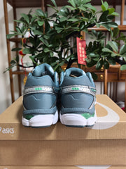 ASICS GEL-Cumulus 16 Sneakers in Green and White