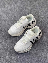 White Chunky Low-Top Sneakers with Black Side Graphics