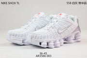 Nike Shox TL Sneakers in Black and Gold