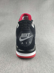 Jordan 4 Retro Sneaker in Black, Red and White